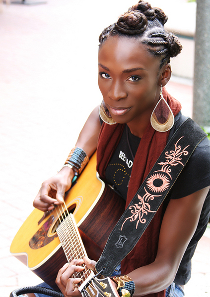 Picture of Angelica Ross with a guitar